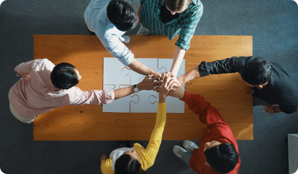 top-down-view-business-man-gather-last-piece-complete-puzzle-convocation